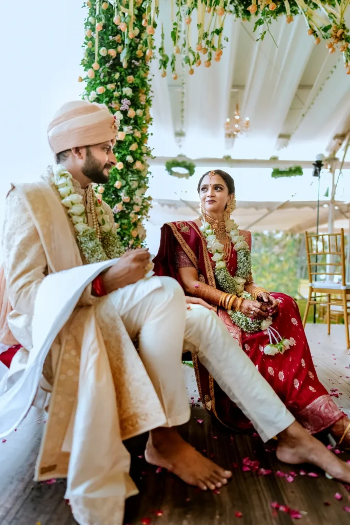 Wedding couple by the sea-facing balcony